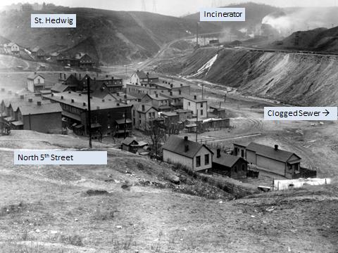 This is the same pre-flood neighborhood shown above, facing west rather than east.Photo donated to the Mifflin Township Historical Society by Dom Toretti .